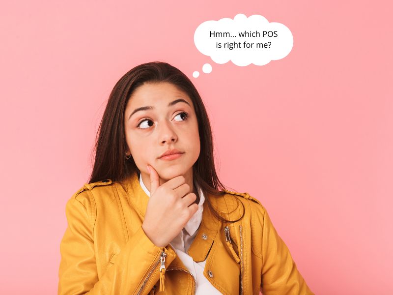 A woman contemplating which point of sale system to choose for her ice cream shop